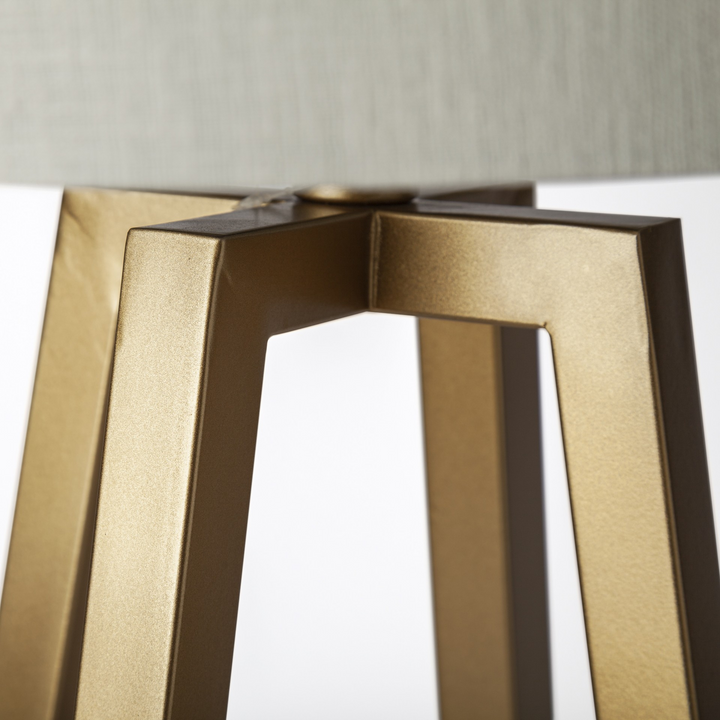 Metallic Gold Tone Geometric Table Lamp with Off-White Drum Shade